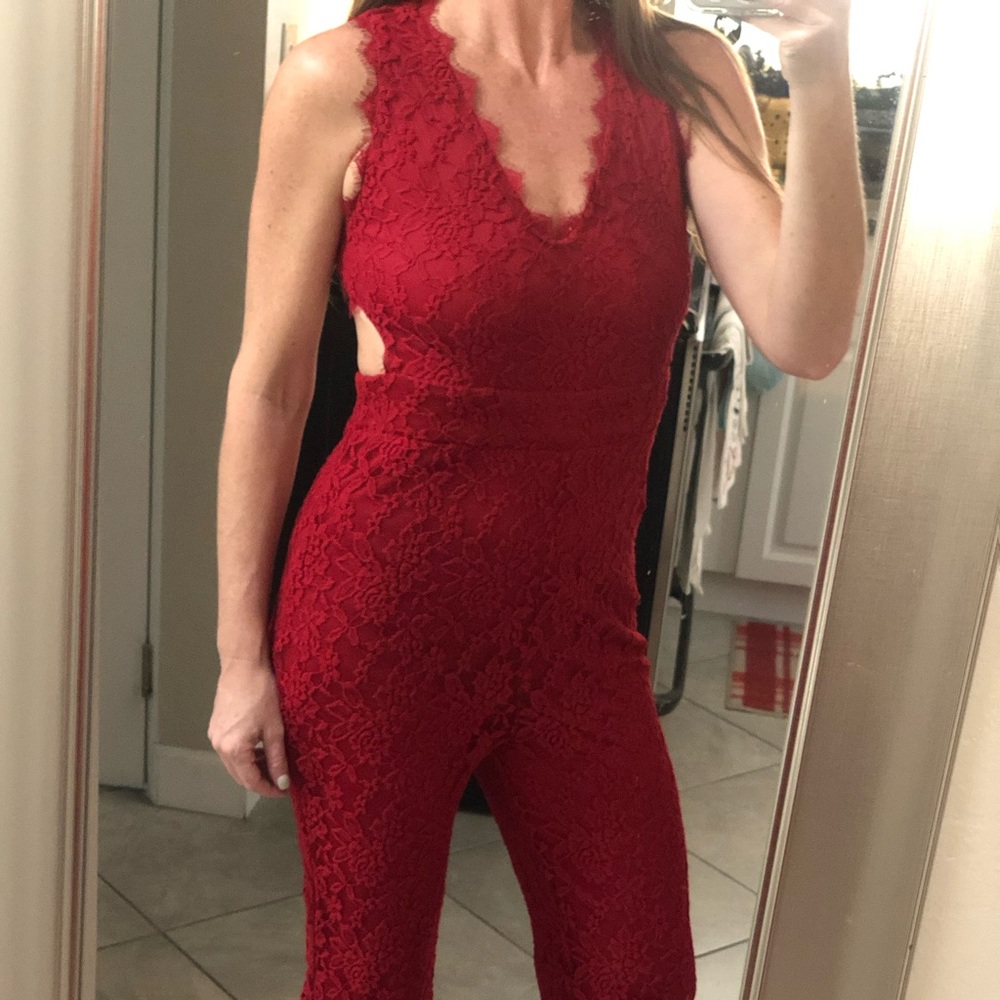 Red lace jumpsuit with back cutout
